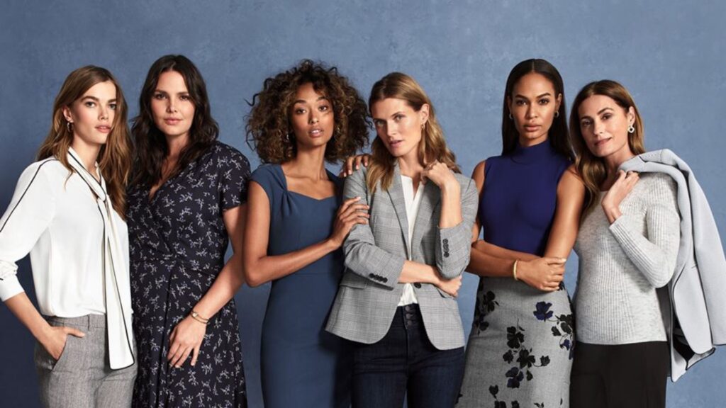 Six women posing in business casual clothing
